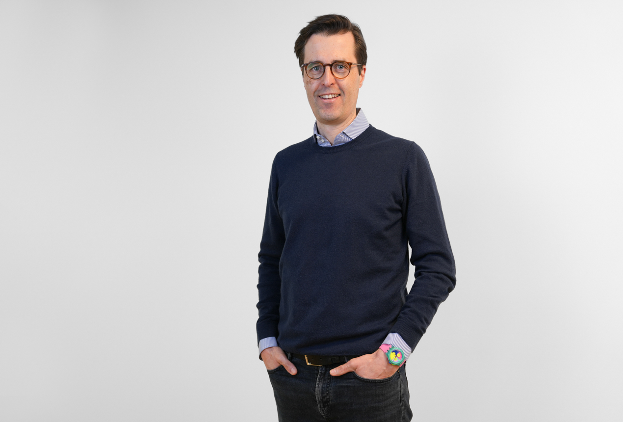 Dr. Tim Schlösser