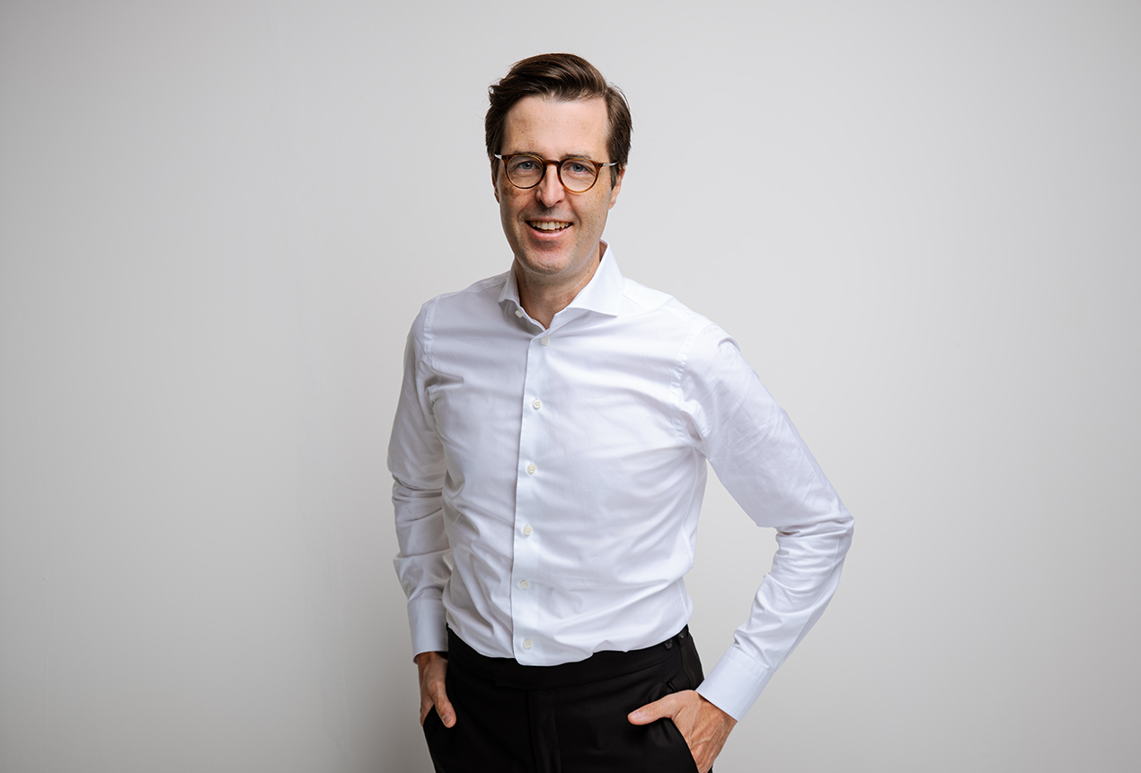Dr. Tim Schlösser