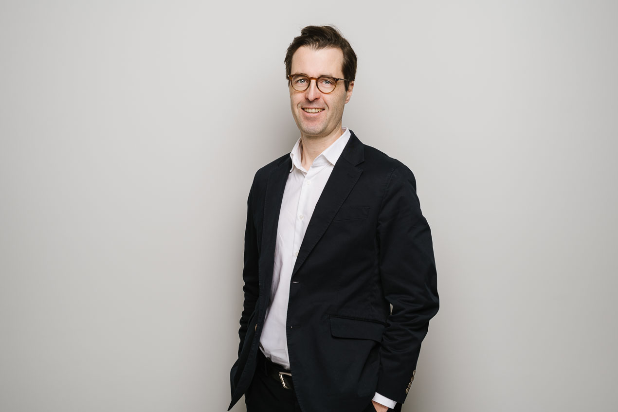 Dr. Tim Schlösser